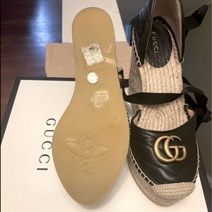 Gucci brand wedged shoes. Almost like brand new. Was worn once.